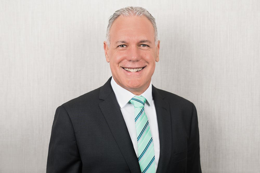 Natural professional corporate headshot for a Sydney business profile